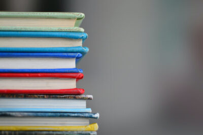 A stack of books with colorful covers.