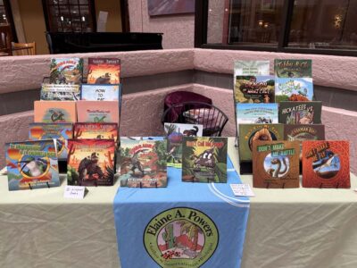 Elaine's book table at the festival, displaying all her Sonoran-based children's book.